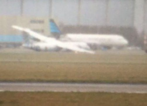  Photos from the scene show the Flybe plane leaning heavily to its right side