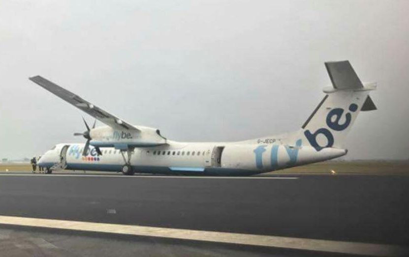  A Flybe plane from Edinburgh to Amsterdam skidded along the runway after its right landing gear collapsed on landing