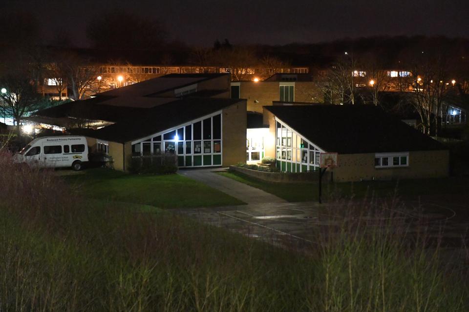  A schoolgirl is critically ill after being hit by a 'falling ceiling tile' at Southwood School in Milton Keynes, pictured on Thursday night