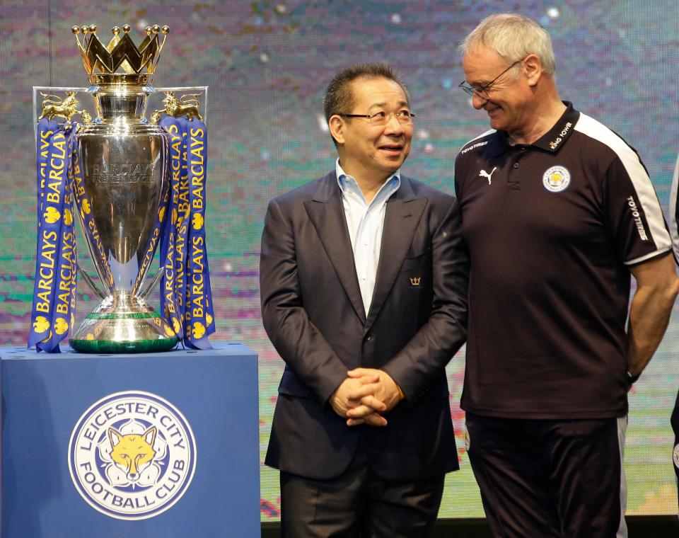  Cutting Thais . . . Club chairman Vichai Srivaddhanaprabha, Claudio Ranieri and the Premier League trophy