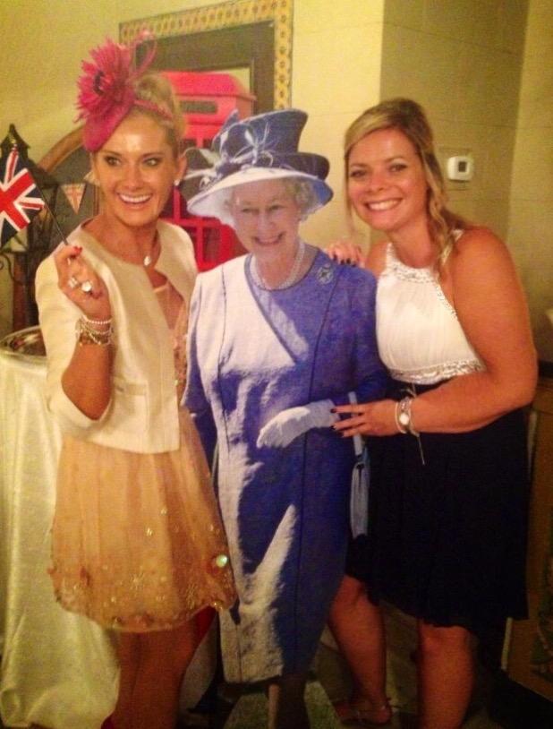  Carla and Vicky together pose alongside a cardboard cut out of Her Majesty The Queen