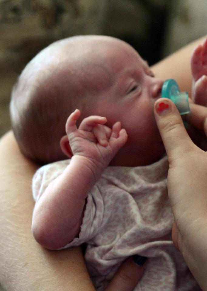  Baby Kaitlyn was born with two thumbs - and when her grandma June was just 32 years old