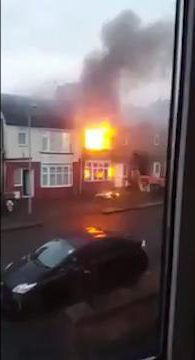  Flames are seen engulfing the semi-detached property in Luton