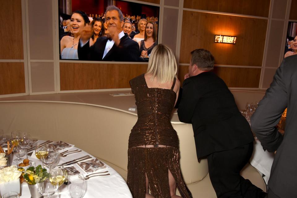  When Katy and James excitedly watched the Oscars, her dress appeared to give way at the top of her bum