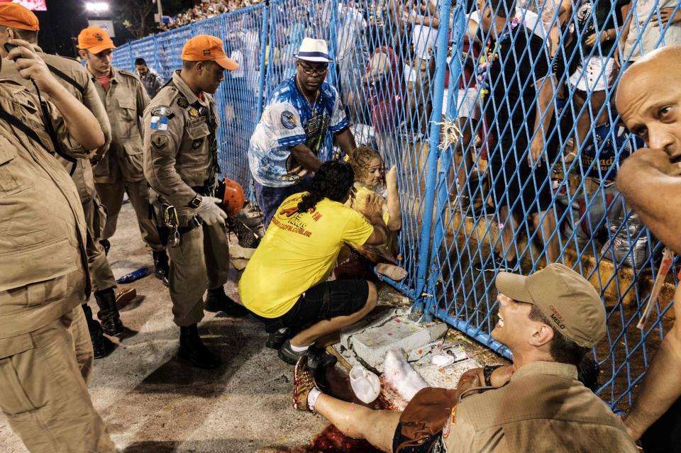  Revellers were jammed against the railing separating the tracks from the stands