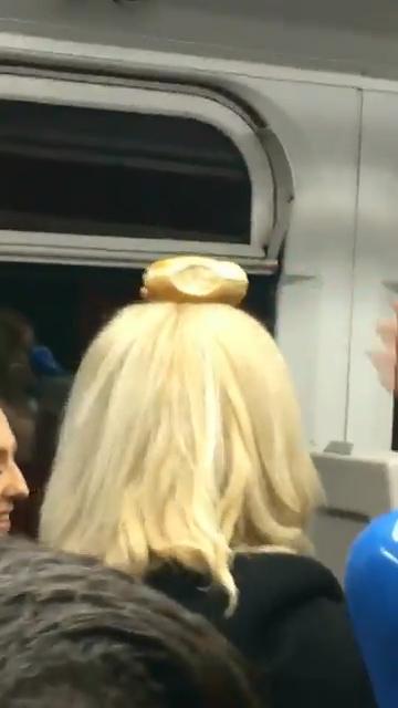  This woman had a bagel placed on her head in a game which continued throughout the journey