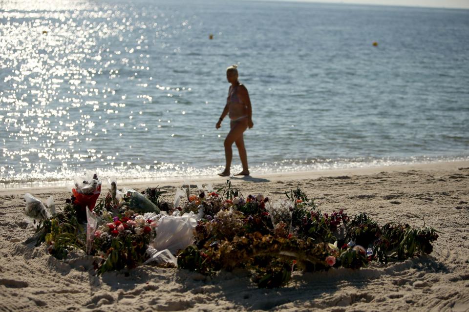  Moving tributes to the victims were left on the beach in the wake of the attack