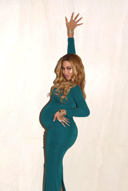  Beyonce strikes a sassy pose with her hand on her hip