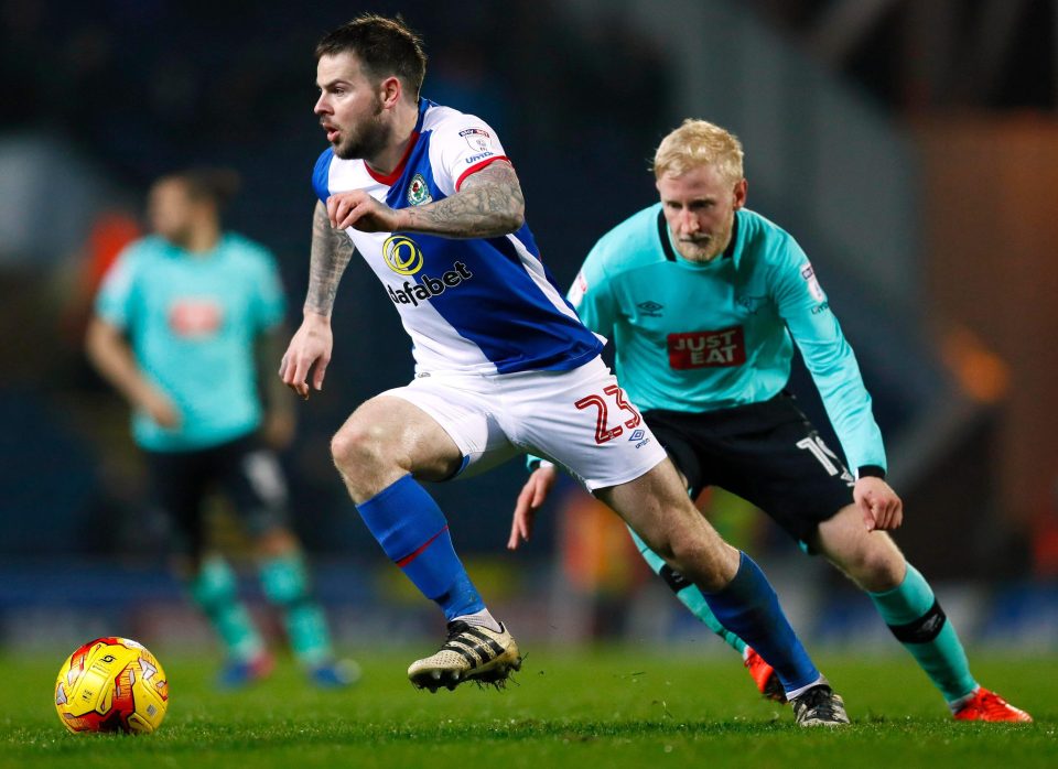  Danny Guthrie evades Will Hughes during the Championship clash