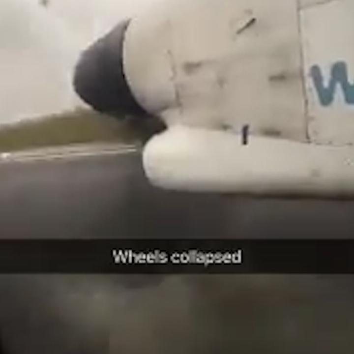  Shocking Snapchat footage taken by a passenger shows sparks and debris flying through the air as the Flybe plane's landing gear collapsed on landing