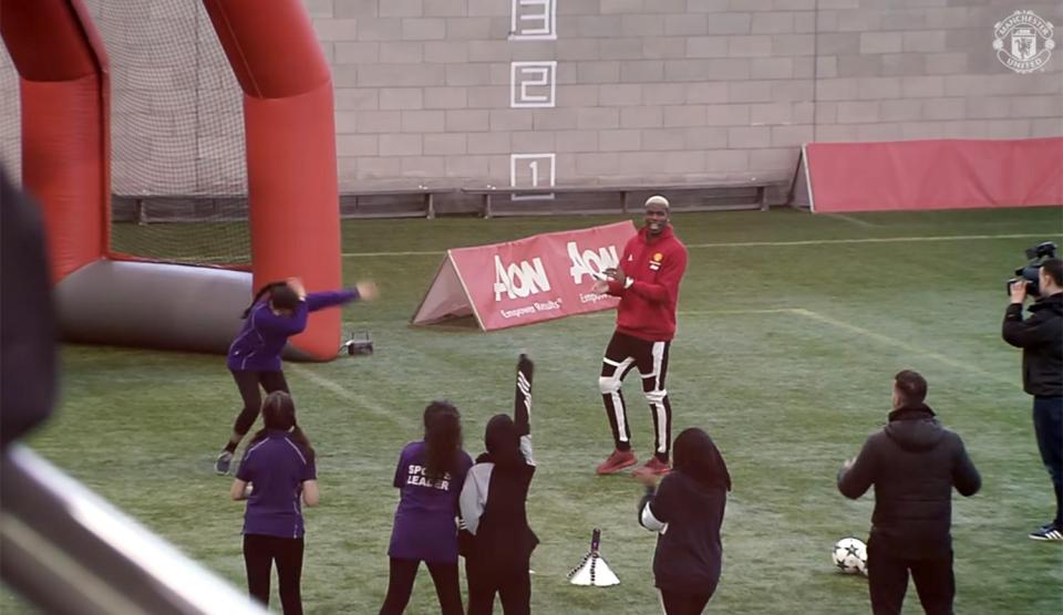  The Frenchman spent the day working with the Manchester United Foundation