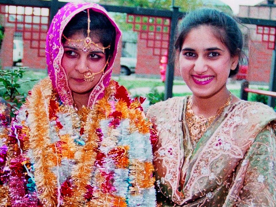  Sarbjit (left) on her wedding day with sister-in-law Surjit: She founded True Honour after Surjit was a victim of a so-called honour killing