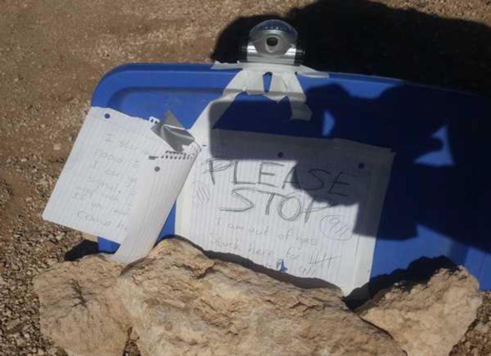  Amber handmade signs asking people to stop and left them on her car