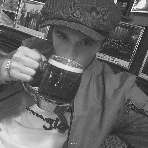  Brooklyn Beckham decided to celebrate turning 18 by sharing a snap of himself sipping on a pint of beer