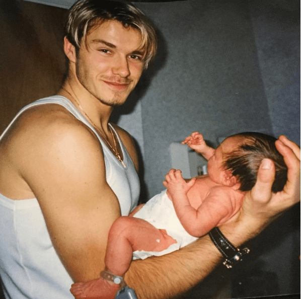  David posted a heart-warming photo of him holding Brooklyn moments after he was born