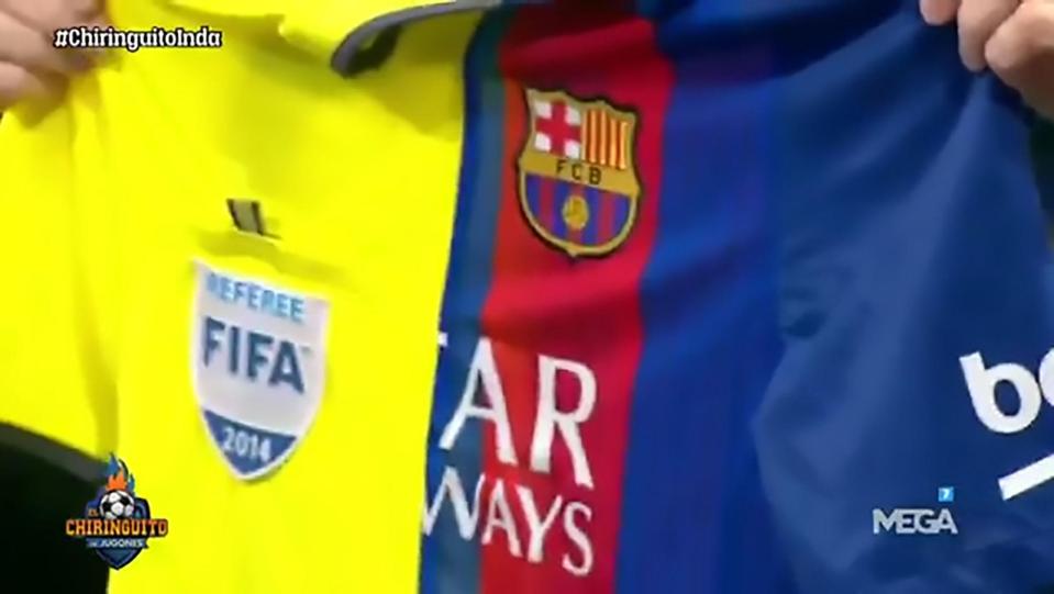  The shirt was part a Fifa ref's shirt and part Barca shirt