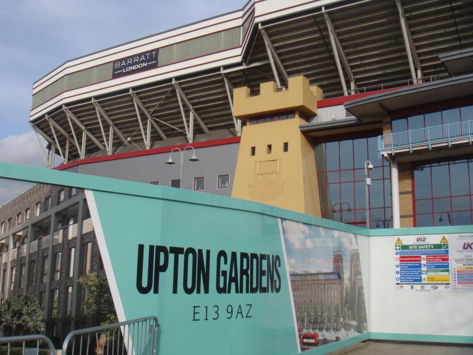  West Ham's old stadium is surrounded by boards showing what will replace it