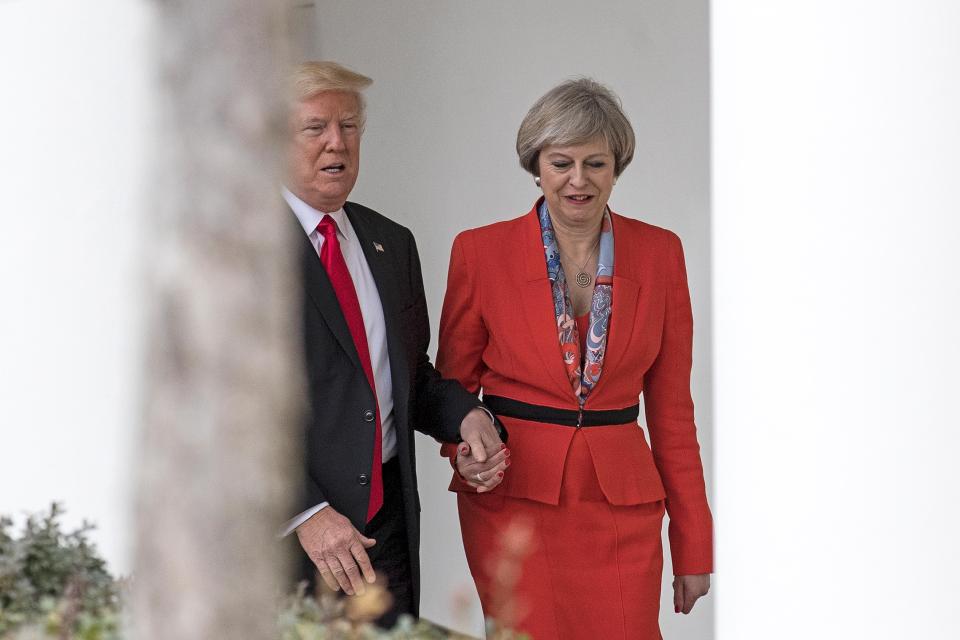  Trump was pictured hand in hand with Theresa May during her visit to the White House