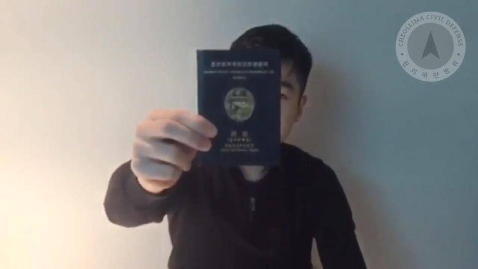  During the broadcast he said he was lying low and displayed his North Korean passport