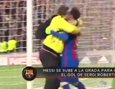  Lionel Messi hugs an emotional pitch invader after the final goal is scored