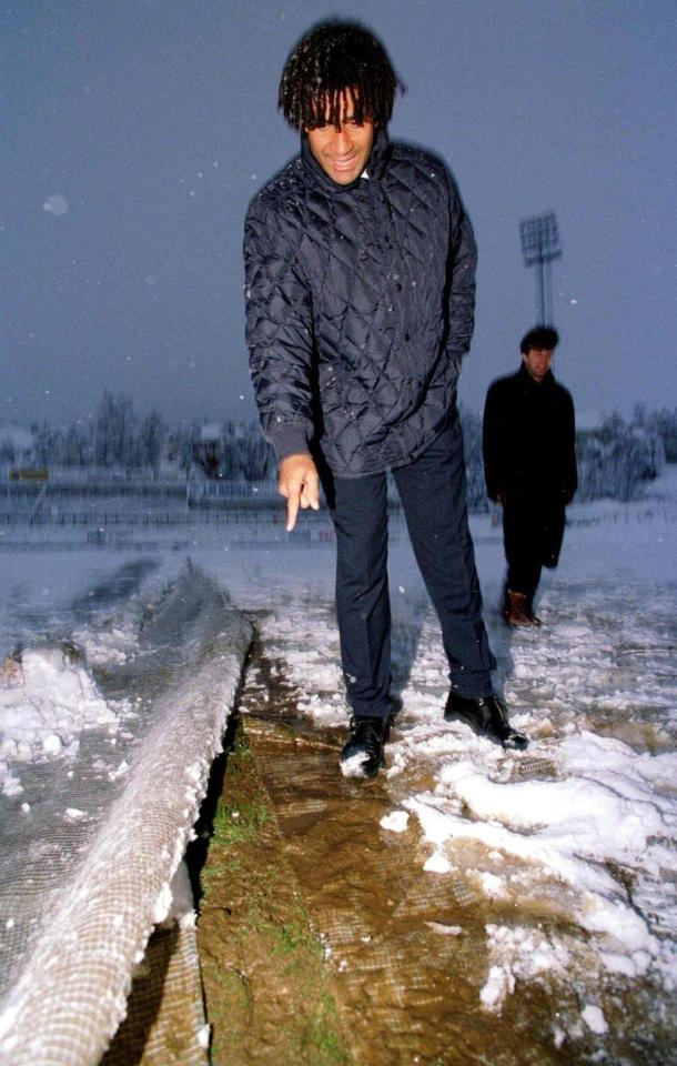  Ruud Gullit inspects the football pitch at Alfheim stadium in Tromso the day before the game