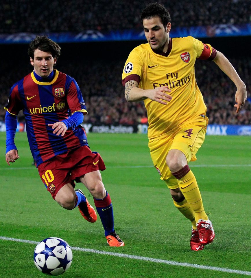  Fabregas on the charge for Arsenal against Messi in the Champions League