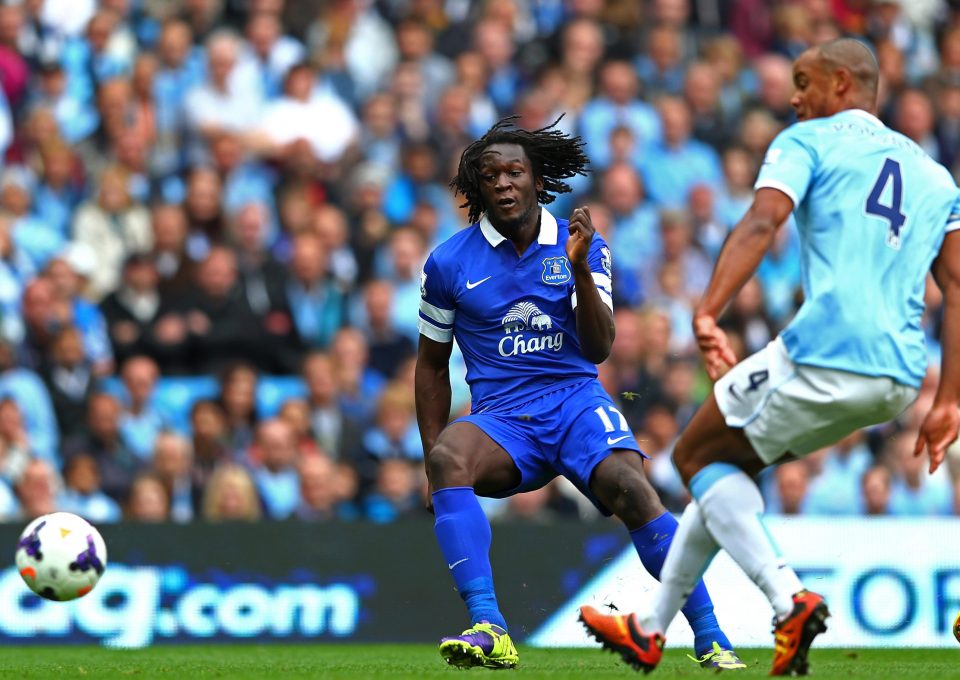  Lukaku in action facing pal and Man City defender Vincent Kompany last season