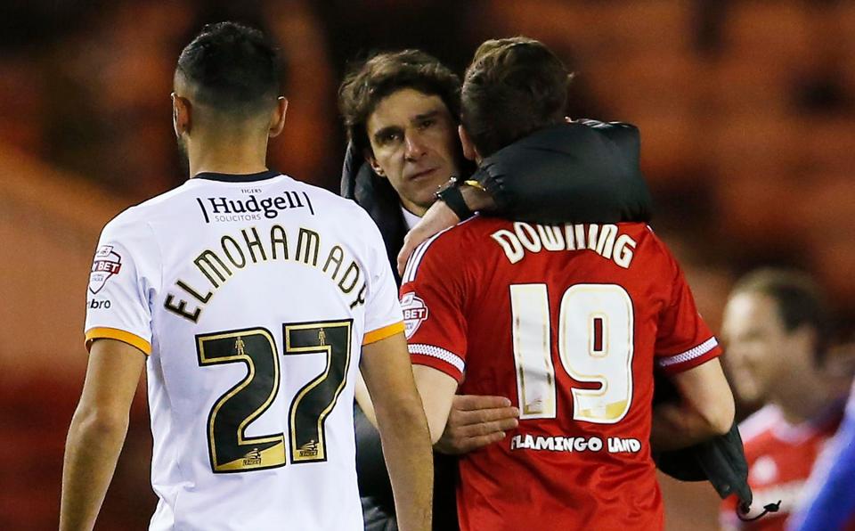  Aitor Karanka embraces Stewart Downing after a win over Hull in the Championship last year