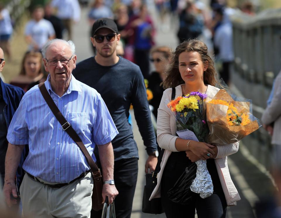  Mourners attend a memorial on the Toll Bridge in Shoreham, West Sussex