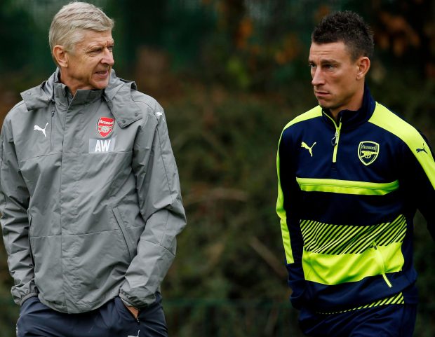 Koscielny says the Arsenal players must up their game to back their under-fire boss