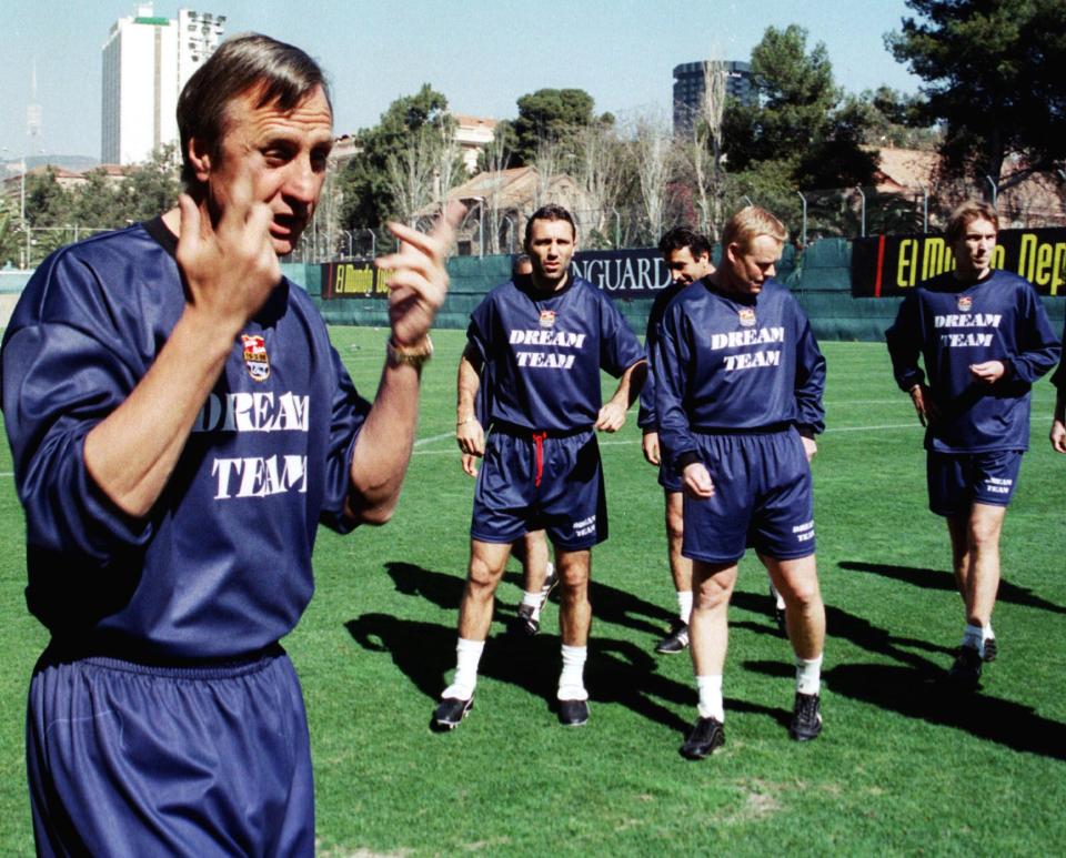  Johan Cruyff gives instructions to his former 'Dream Team' players (L-R) Bulgarian Hristo Stoichkov, Dutch players Ronald Koeman and Richard Witschge