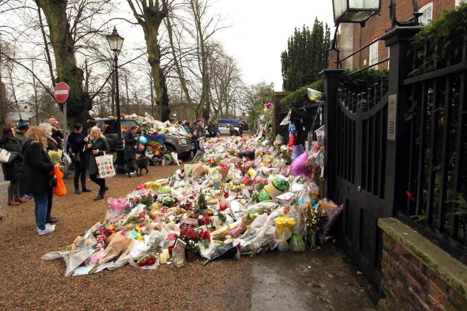  Flowers by the road . . . George Michael's Wham! band paid tribute to star at the Brits