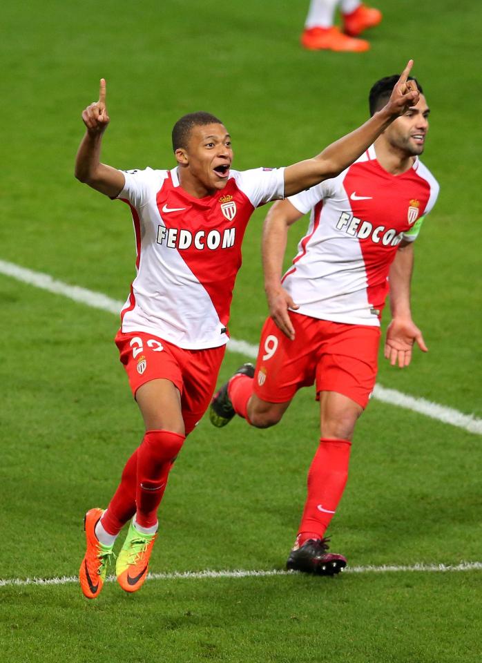  Kylian Mbappe celebrates with Radamel Falcao after scoring their second goal during the UEFA Champions League against Manchester City