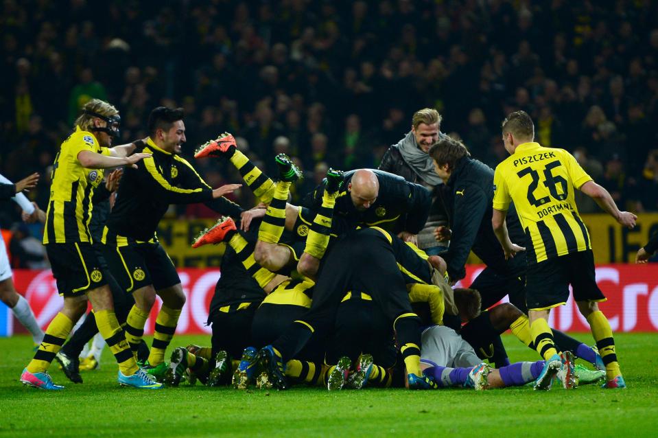  Borussia Dortmund scored twice in stoppage time to eliminate Malaga in 2013