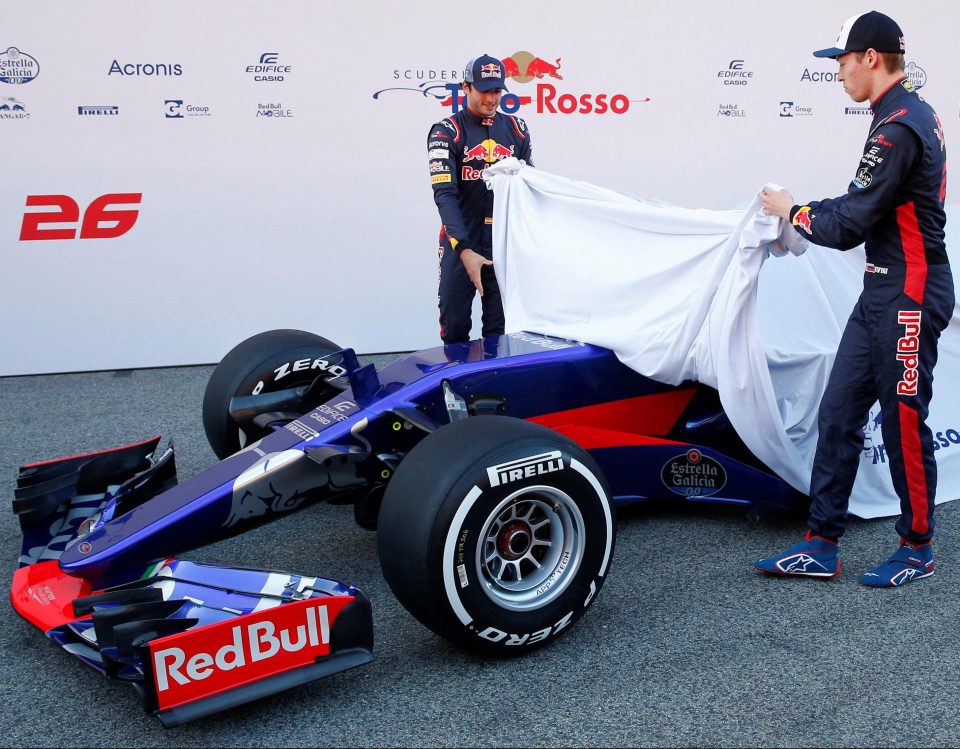  Toro Rosso drivers Daniil Kvyat and Carlos Sainz show off the new STR12 racing car