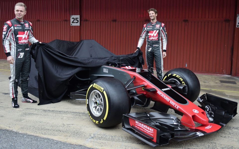  Kevin Magnussen and HAAS's French driver Romain Grosjean unveil their new VF17 car