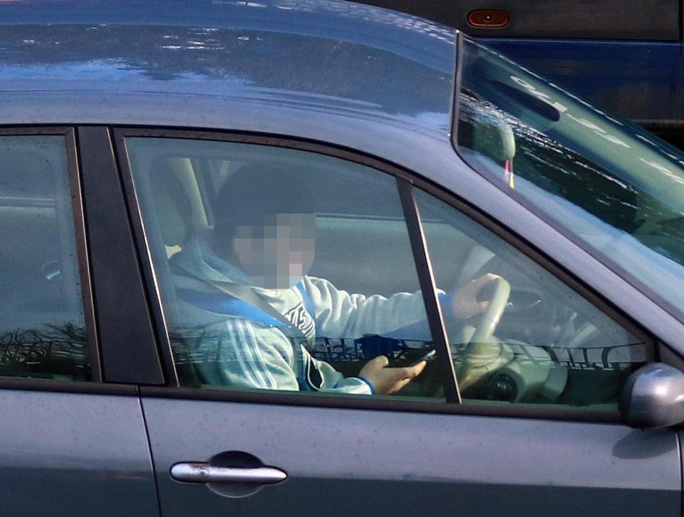  In Cambridgeshire this driver was also on his phone - despite the change in law today