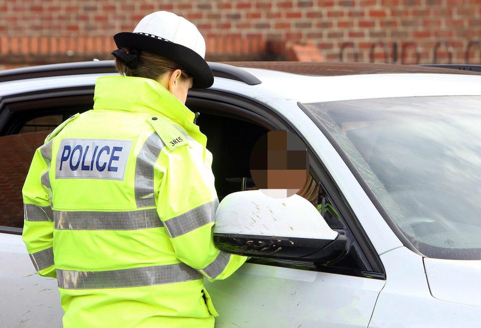  Police cracked down on drivers all over the UK - here a motorist in Staffordshire is pulled over