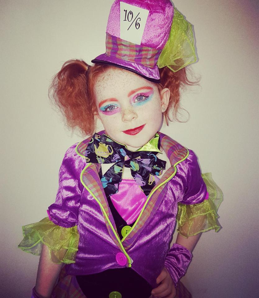  Lacie Mccarthy, 6, is dressed as the crazy Mad Hatter