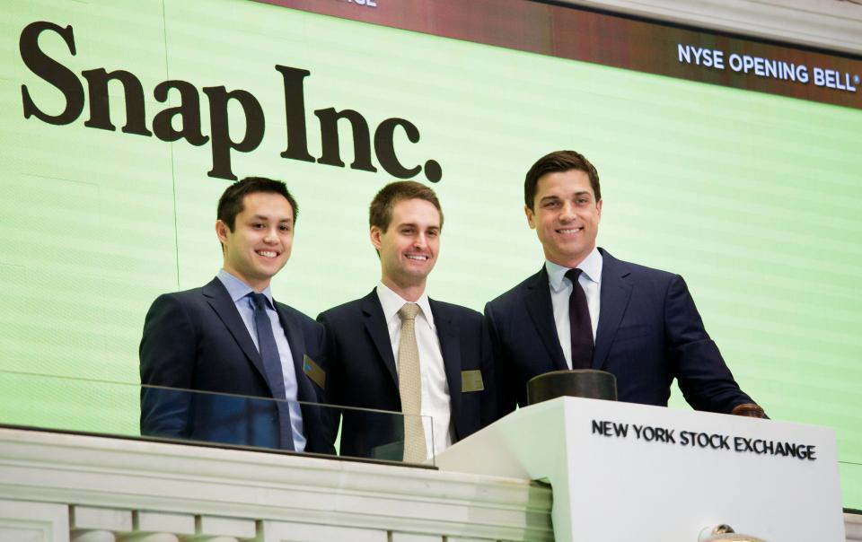  Snapchat co-founders Bobby Murphy (left) and Evan Spiegel (centre) at the New York Stock Exchange