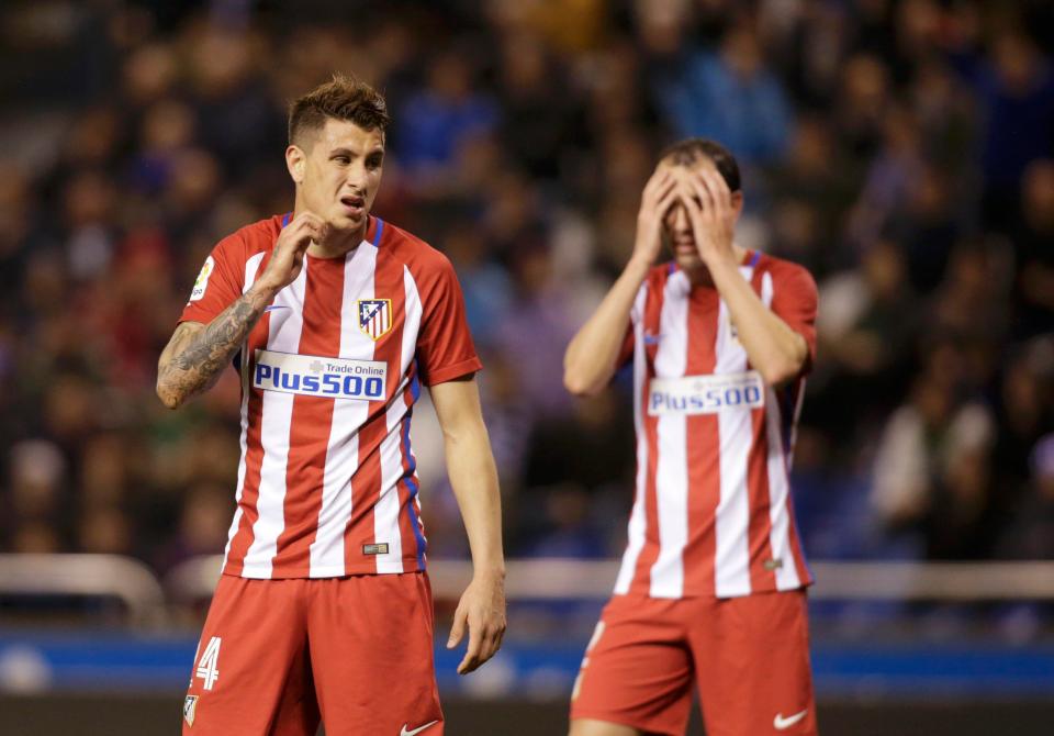  Jose Gimenez (left) after he combined with Jan Oblak to gift Deportivo the opener