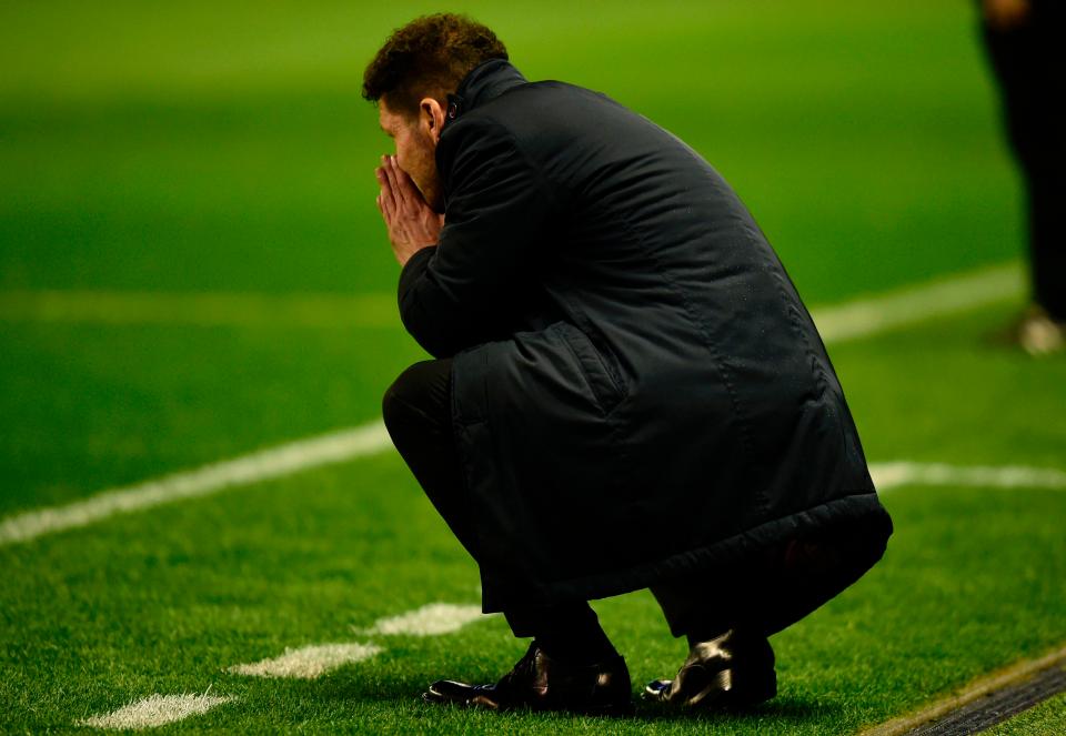  Atletico Madrid boss Diego Simeone looks concerned on the sidelines