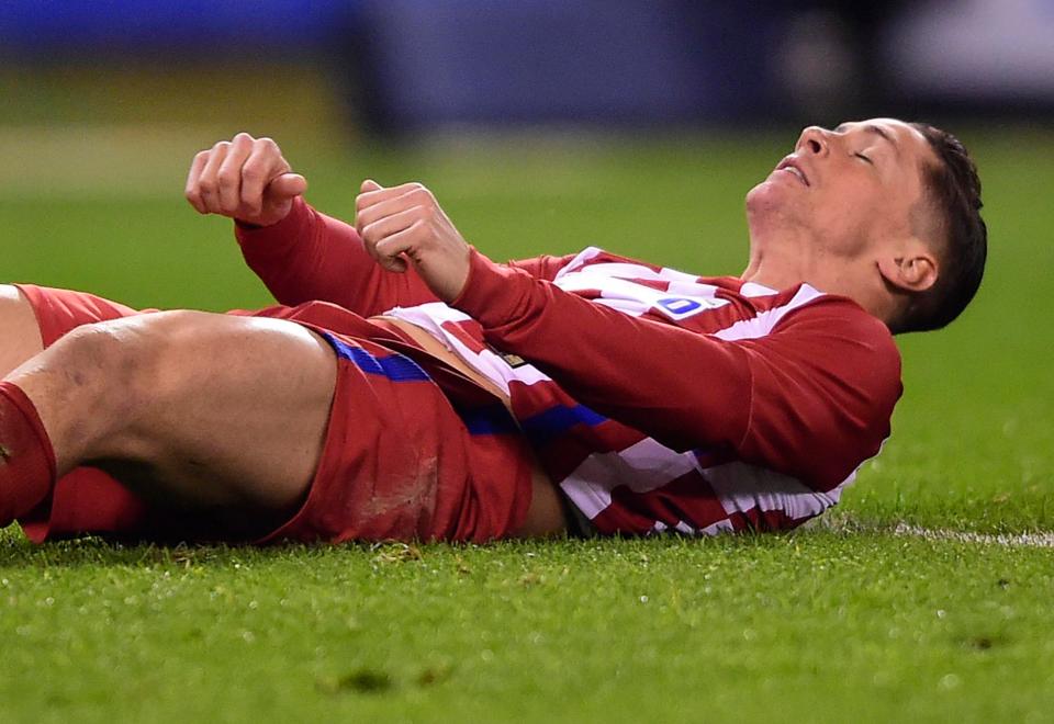  Torres appeared to be unconscious as soon as he hit the turf