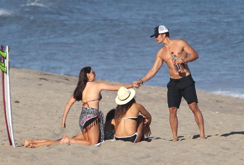  He got friendly with the girls as they soaked up the sun