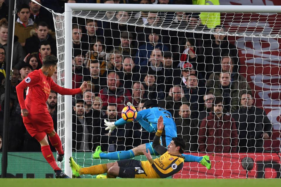  Robert Firmino slams the ball into the roof of the net for the opener