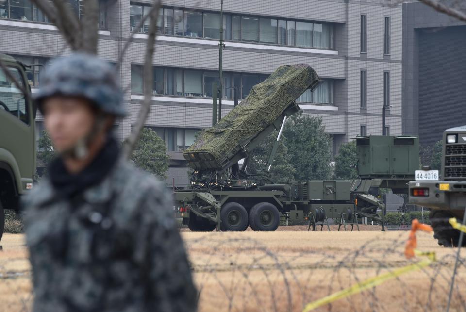  A Japanese soldier guards a PAC-3 surface-to-air missile launcher unit in Tokyo