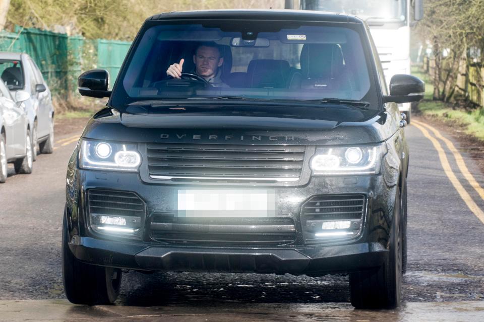  Wayne Rooney pulled up at Carrington in his black Range Rover