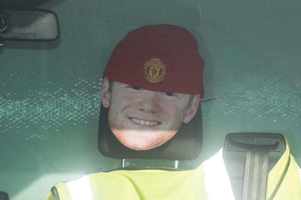  Whilst his cut-out double was wrapped up in a woolly Red Devils hat