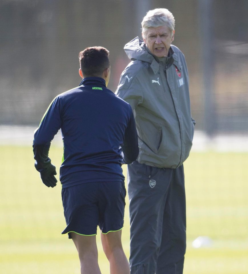  Arsene Wenger and Alexis Sanchez shake hands days after a training ground bust-up lead to the Chilean being dropped for the Liverpool game