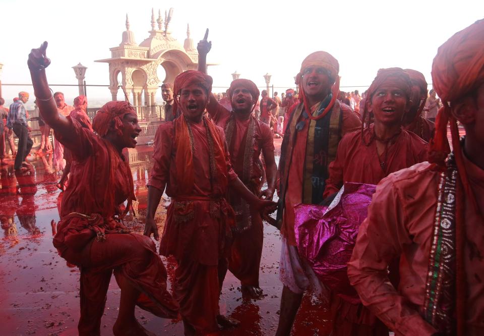  Hindus celebrate Holi by smearing coloured powder over one another, dancing under water sprinklers, and using water balloons and water guns